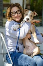 EDIE FALCO Out with Her Dog Mackie in New York 04/20/2023