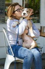 EDIE FALCO Out with Her Dog Mackie in New York 04/20/2023