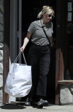 EMMA ROBERTS Gets a Few Clothing Items Altered in Los Angeles 04/07/2023