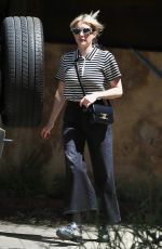EMMA ROBERTS Gets a Few Clothing Items Altered in Los Angeles 04/07/2023