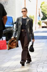 HAILEY BIEBER Leaves Rhode