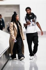 HALLE BAILEY Arrives at LAX Airport in Los Angeles 04/10/2023