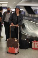 JENNIFER TILLY Arrives at LAX Airport in Los Angeles 04/16/2023