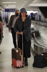 JENNIFER TILLY Arrives at LAX Airport in Los Angeles 04/16/2023