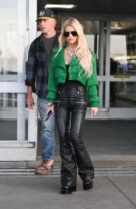 JESSICA SIMPSON and Eric Johnson Arrives at JFK Airport in New York 04/12/2023