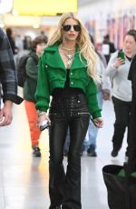 JESSICA SIMPSON and Eric Johnson Arrives at JFK Airport in New York 04/12/2023