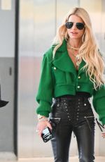 JESSICA SIMPSON and Eric Johnson Arrives at JFK Airport in New York 04/12/2023