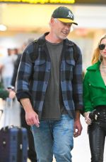 JESSICA SIMPSON and Eric Johnson Arrives at JFK Airport in New York 04/12/2023