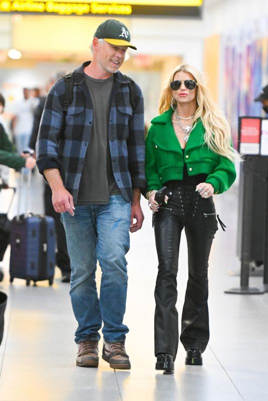 JESSICA SIMPSON and Eric Johnson Arrives at JFK Airport in New York 04/12/2023