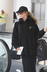 JULIANNE HOUGH Arrives at LAX Airport in Los Angeles 04/25/2023