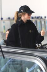 JULIANNE HOUGH Arrives at LAX Airport in Los Angeles 04/25/2023