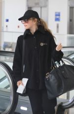 JULIANNE HOUGH Arrives at LAX Airport in Los Angeles 04/25/2023