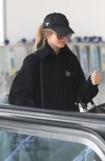 JULIANNE HOUGH Arrives at LAX Airport in Los Angeles 04/25/2023