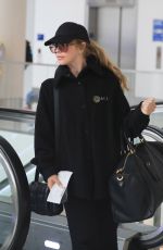 JULIANNE HOUGH Arrives at LAX Airport in Los Angeles 04/25/2023