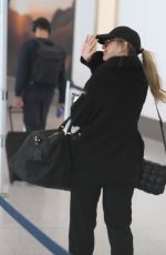 JULIANNE HOUGH Arrives at LAX Airport in Los Angeles 04/25/2023