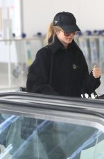 JULIANNE HOUGH Arrives at LAX Airport in Los Angeles 04/25/2023