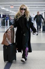 KATHRYN NEWTON Arrives at LAX Airport in Los Angeles 04/03/2023