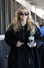 KATHRYN NEWTON Arrives at LAX Airport in Los Angeles 04/03/2023