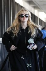 KATHRYN NEWTON Arrives at LAX Airport in Los Angeles 04/03/2023