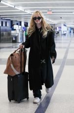 KATHRYN NEWTON Arrives at LAX Airport in Los Angeles 04/03/2023