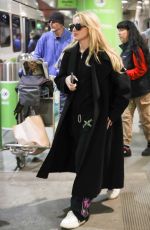 KATHRYN NEWTON Arrives at LAX Airport in Los Angeles 04/11/2023