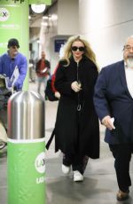 KATHRYN NEWTON Arrives at LAX Airport in Los Angeles 04/11/2023