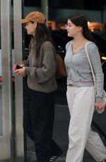 KATIE HOLMES and SURI CRUSIE at LAX Airport in Los Angeles 04/24/2023