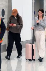 KATIE HOLMES and SURI CRUSIE at LAX Airport in Los Angeles 04/24/2023