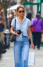 KATIE HOLMES Out for Solo Shopping in New York 04/14/2023