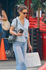 KATIE HOLMES Out for Solo Shopping in New York 04/14/2023