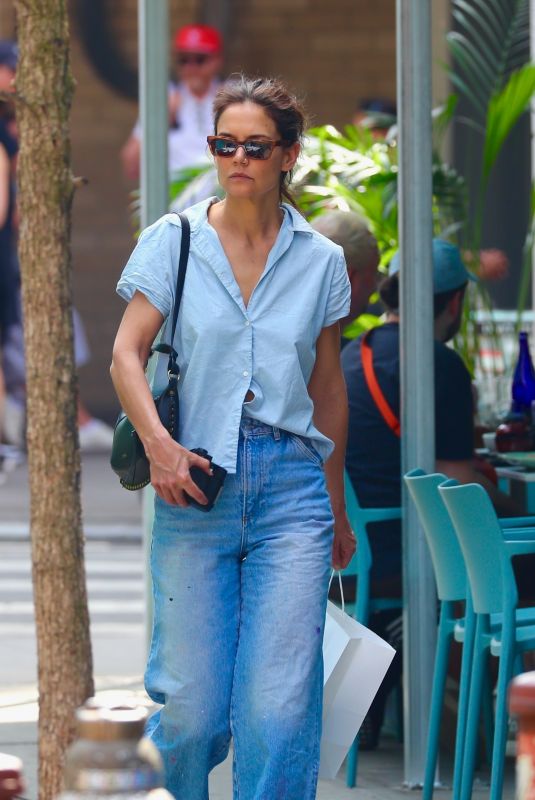 KATIE HOLMES Out for Solo Shopping in New York 04/14/2023