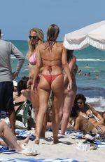 KIMBERLEY GARNER in Bikini with Friends at Soho Beach House in Miami Beach 04/07/2023