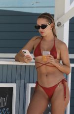 KIMBERLEY GARNER in Bikini with Friends at Soho Beach House in Miami Beach 04/07/2023