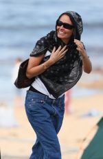 LARA BINGLE in Swimsuit at a Photoshoot at a Beach in Sydney 04/15/2023