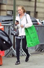 LARA BINGLE Leaves Spa Belle in West Village After Shopping at Saks 5th Avenue 04/26/2023