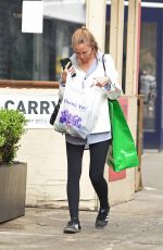 LARA BINGLE Leaves Spa Belle in West Village After Shopping at Saks 5th Avenue 04/26/2023