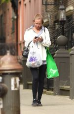 LARA BINGLE Leaves Spa Belle in West Village After Shopping at Saks 5th Avenue 04/26/2023