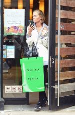 LARA BINGLE Leaves Spa Belle in West Village After Shopping at Saks 5th Avenue 04/26/2023