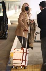 LAURA DERN Arrives at LAX Airport in Los Angeles 04/24/2023