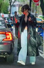 LILY JAMES Out and About in New York 04/25/2023