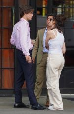 LILY JAMES Outside Her Hotel with Friends in New York 04/16/2023