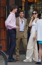 LILY JAMES Outside Her Hotel with Friends in New York 04/16/2023