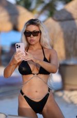 LISA OPIE in a Black Bikini on Vacation in Mexico 04/06/2023