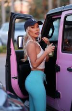 LISA OPIE Out with Her Dog in Miami 04/26/2023
