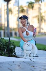 LISA OPIE Out with Her Dog in Miami 04/26/2023