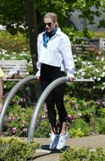 MICHELLE HUNZIKER Working Out at a Park in Milan 04/25/2023