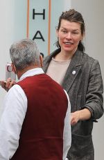 MILLA JOVOVICH Leaves a Skin Care Clinic in Beverly Hills 04/17/2023