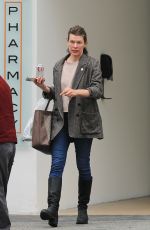 MILLA JOVOVICH Leaves a Skin Care Clinic in Beverly Hills 04/17/2023