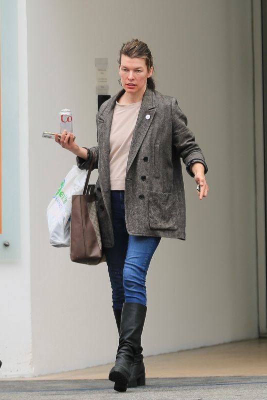 MILLA JOVOVICH Leaves a Skin Care Clinic in Beverly Hills 04/17/2023