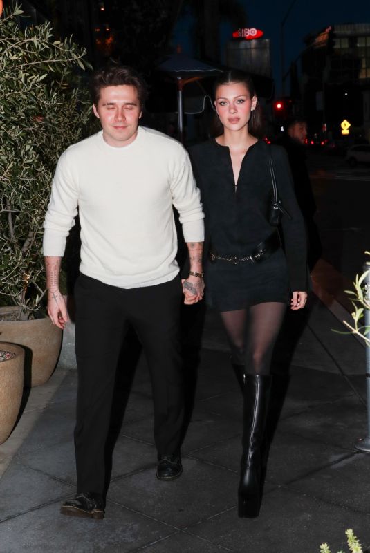NICOLA PELTZ and Brooklyn Beckham Arrives at Lavo Restaurant in West Hollywood 03/30/2023